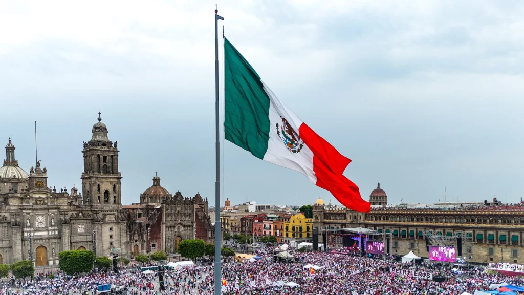 One Law After Another: The Worldwide Rethink of Teen Social Media The Mexican flag flying over the Zocalo main square in Mexico City